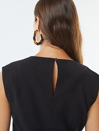Blusa larga con fibbia integrata