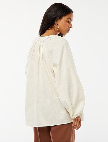 Blusa larga in cotone con ricami