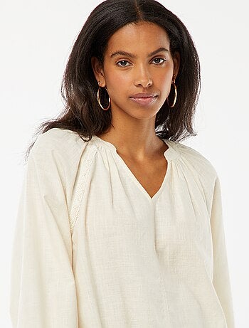 Blusa larga in cotone con ricami