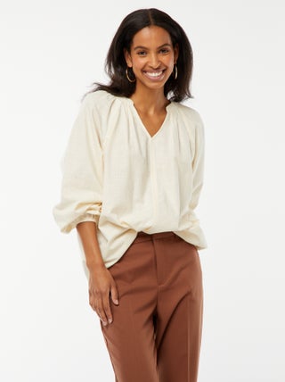 Blusa larga in cotone con ricami