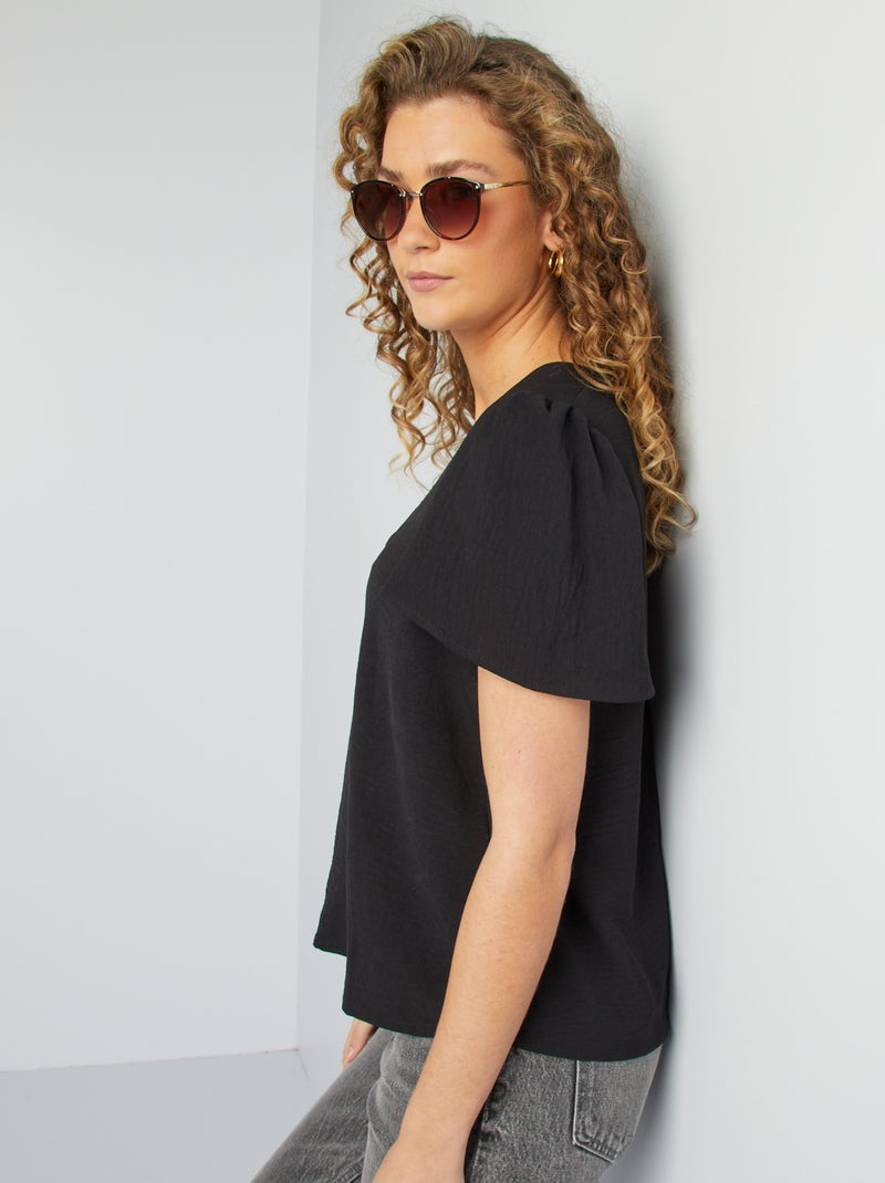 Blusa leggera con volant nero - Kiabi
