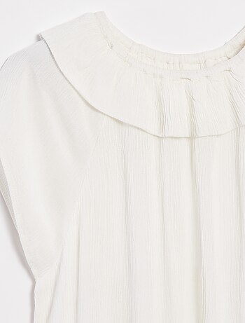 Blusa leggera senza maniche tinta unita