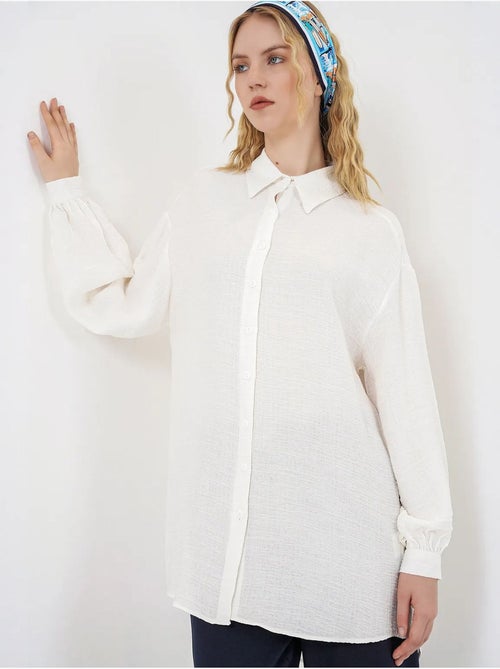 Blusa lunga oversize testurizzata con collo a camicia bdart - Kiabi Blusa lunga oversize testurizzata con collo a camicia bdart - Kiabi