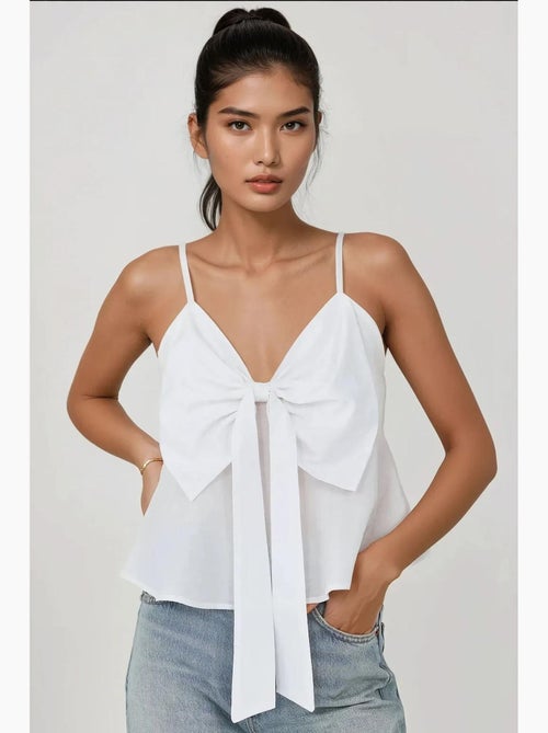 Blusa morbida al tatto con scollo a v e dettaglio fiocco hiccup - Kiabi Blusa morbida al tatto con scollo a v e dettaglio fiocco hiccup - Kiabi