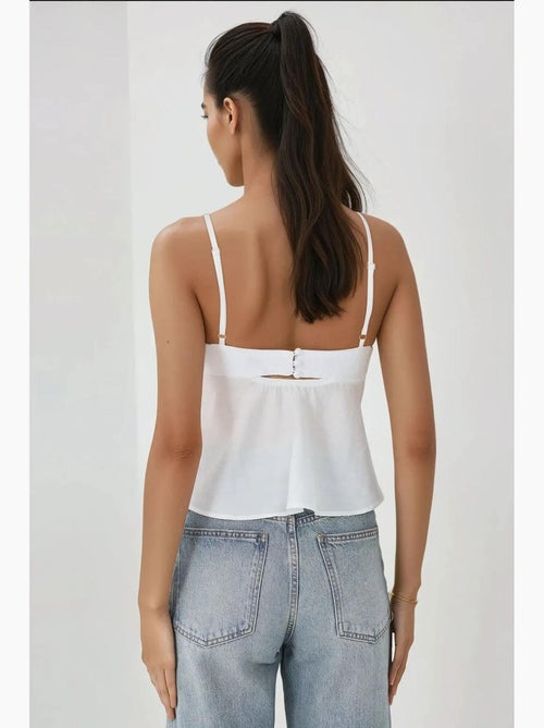 Blusa morbida al tatto con scollo a v e dettaglio fiocco hiccup - Kiabi Blusa morbida al tatto con scollo a v e dettaglio fiocco hiccup - Kiabi