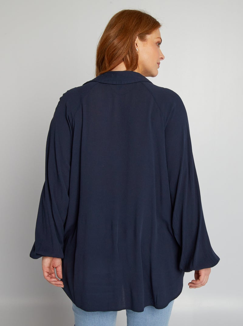Blusa con maniche corte a sbuffo