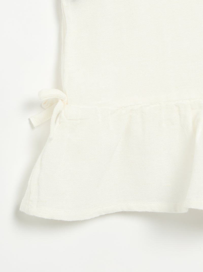 Blusa peplum con fiocchi fantasia Bianco - Kiabi