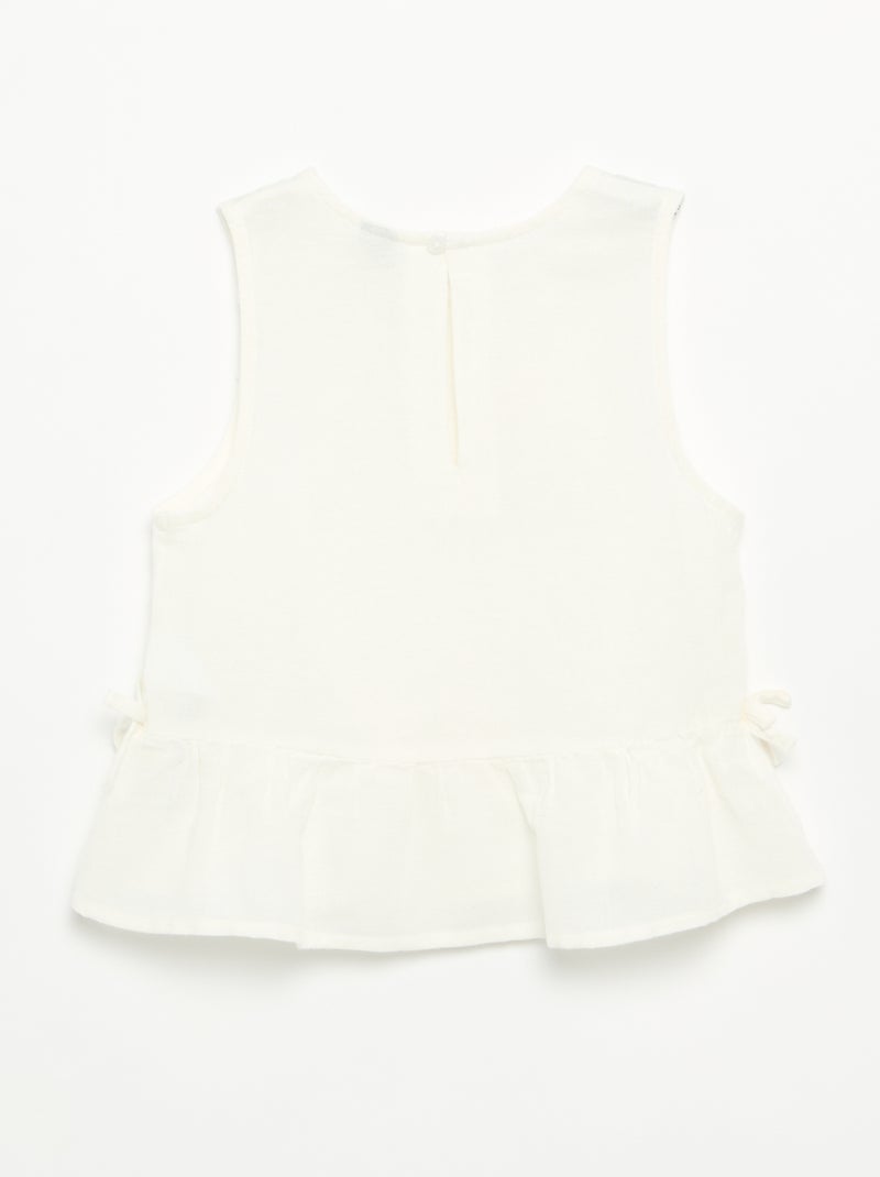Blusa peplum con fiocchi fantasia Bianco - Kiabi
