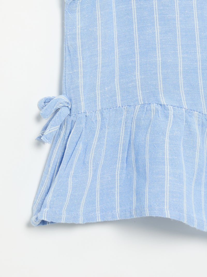 Blusa peplum con fiocchi fantasia Blu - Kiabi