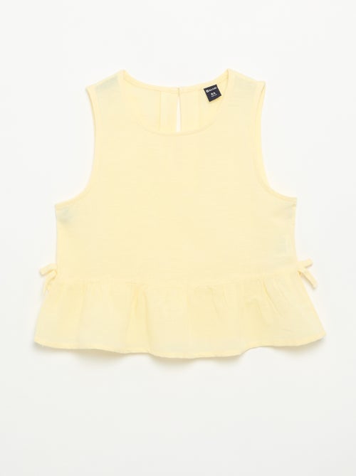 Blusa peplum con fiocchi fantasia - Kiabi