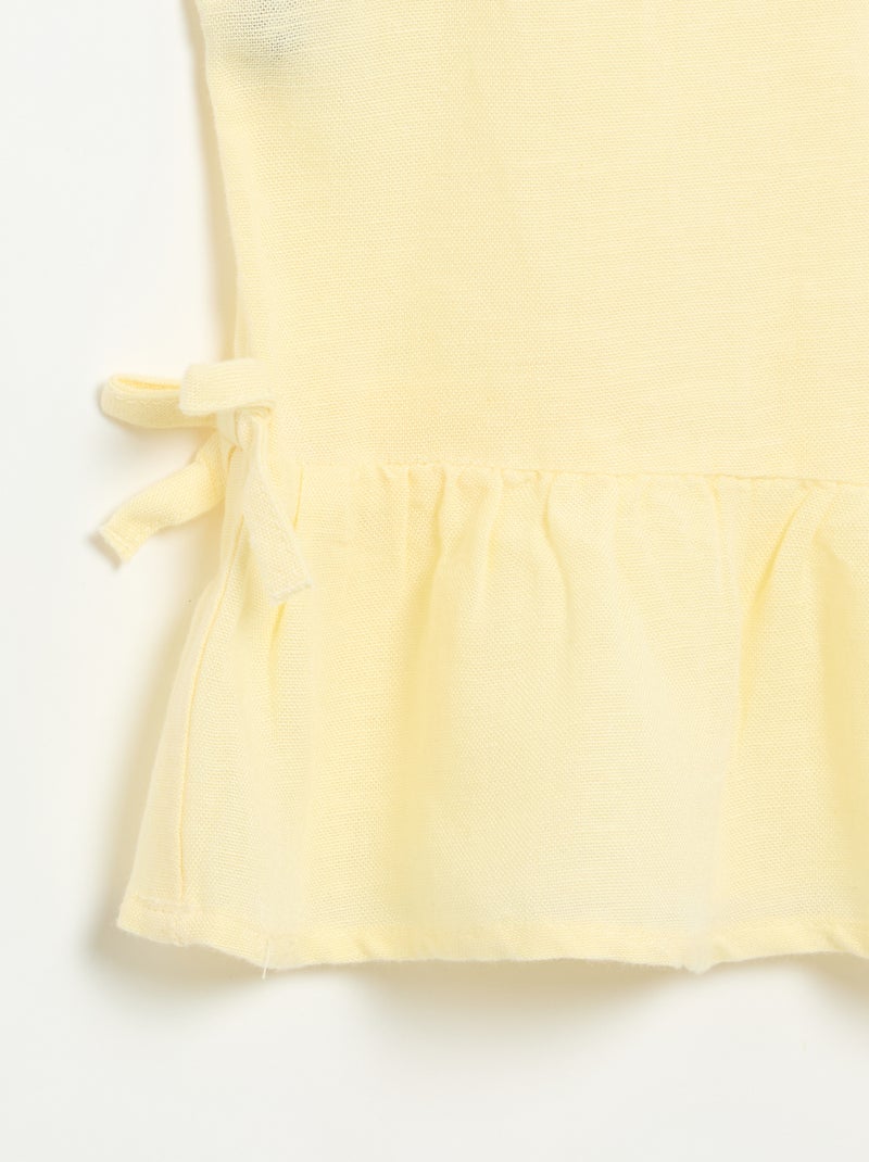 Blusa peplum con fiocchi fantasia Giallo - Kiabi