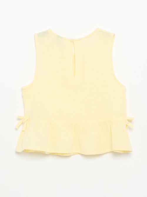 Blusa peplum con fiocchi fantasia - Kiabi