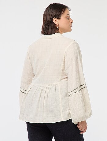 Blusa ricamata a maniche lunghe