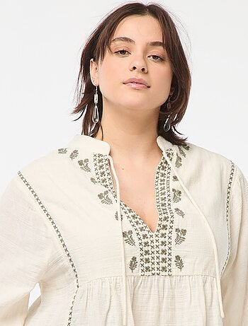 Blusa ricamata a maniche lunghe