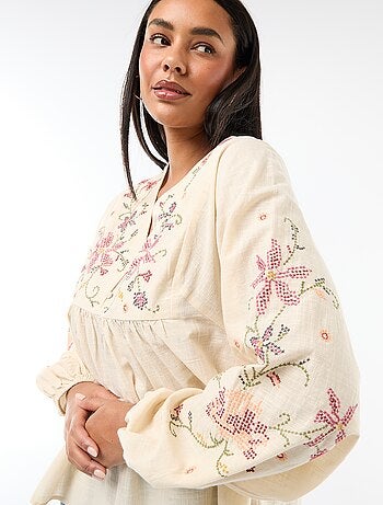 Blusa ricamata con fiori