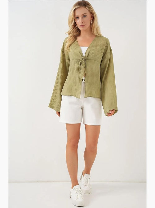 Blusa scollo a v con fiocco bdart - Kiabi Blusa scollo a v con fiocco bdart - Kiabi
