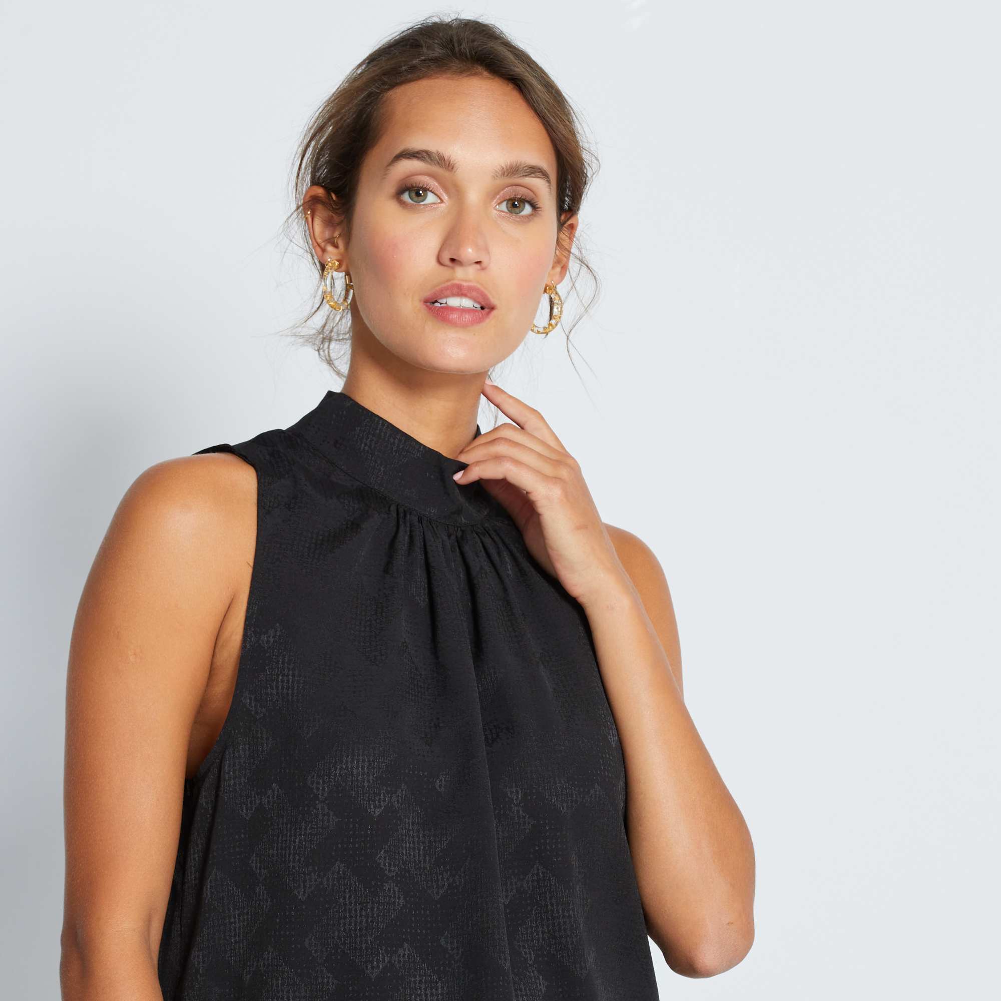 Blusa senza maniche con collo alto Donna nero Kiabi 12,00€ Blusa senza maniche con collo alto Donna nero Kiabi 12,00€