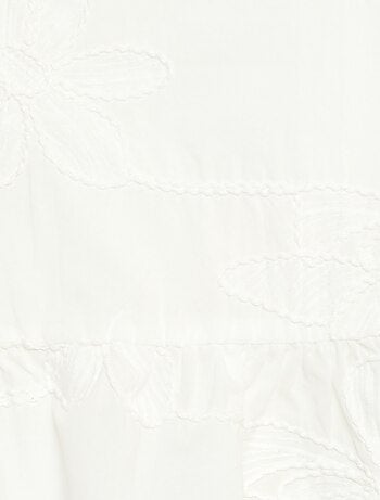 Blusa senza maniche con ricami floreali