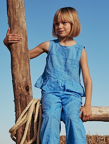 Blusa senza maniche con ricami floreali