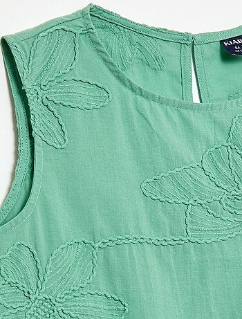 Blusa senza maniche con ricami floreali