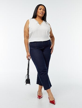 Blusa senza maniche con scollo a V e bordi in pizzo
