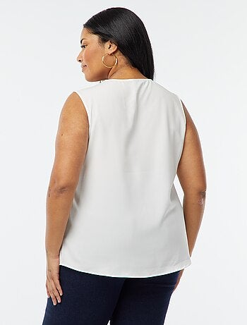 Blusa senza maniche con scollo a V e bordi in pizzo