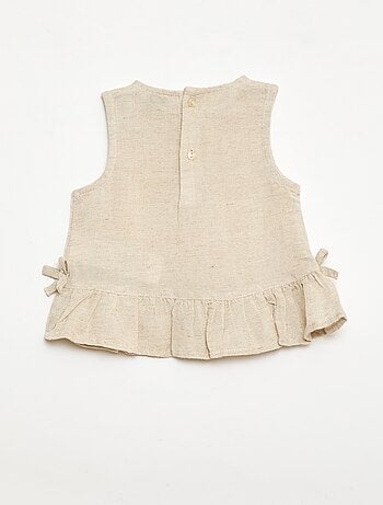Blusa senza maniche con volant e fiocchi