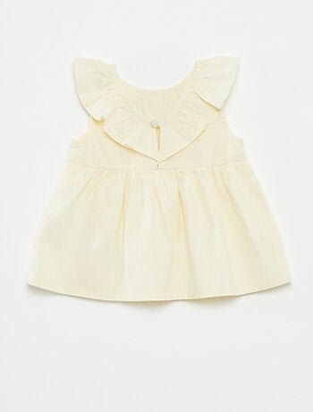 Blusa senza maniche con volant sul davantino