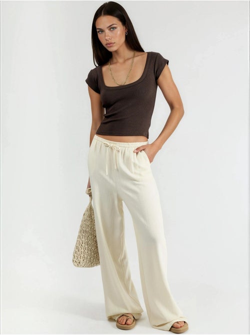 Blusa slim fit a coste con scollo a u busem - Kiabi Blusa slim fit a coste con scollo a u busem - Kiabi