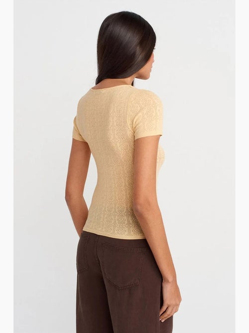 Blusa slim fit a coste testurizzate dilvin - Kiabi Blusa slim fit a coste testurizzate dilvin - Kiabi