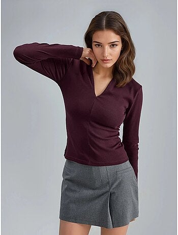 Blusa slim fit a maniche lunghe con scollo a v busem