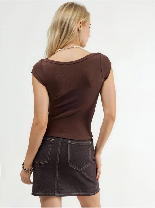 Blusa slim fit con scollo a barca busem - Kiabi Blusa slim fit con scollo a barca busem - Kiabi