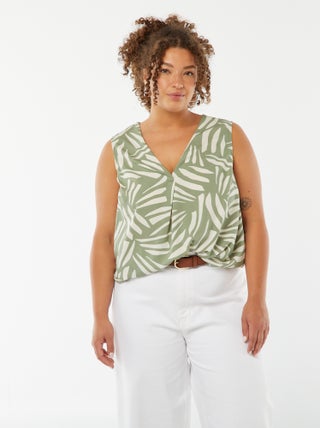 Blusa tinta unita con cucitura fantasia sul collo