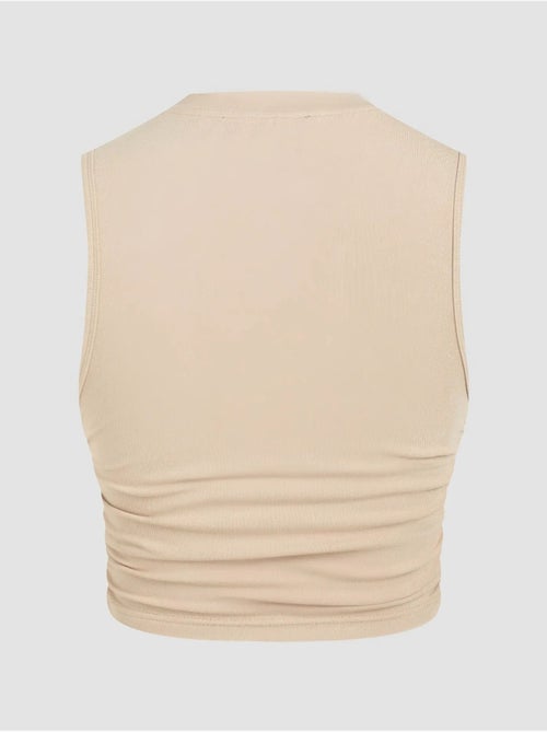 Blusa tinta unita con dettagli arricciati hiccup - Kiabi Blusa tinta unita con dettagli arricciati hiccup - Kiabi