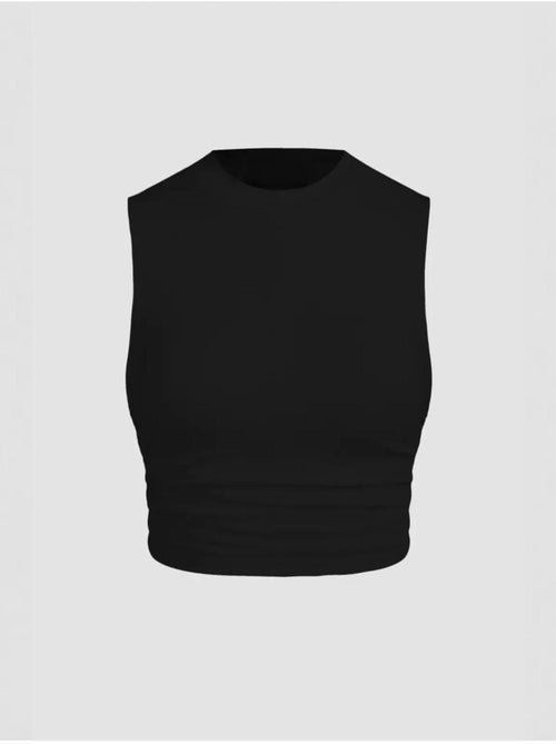 Blusa tinta unita con dettagli arricciati hiccup - Kiabi Blusa tinta unita con dettagli arricciati hiccup - Kiabi