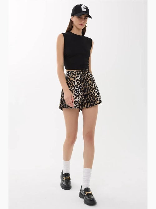 Blusa tinta unita con dettagli arricciati hiccup - Kiabi Blusa tinta unita con dettagli arricciati hiccup - Kiabi