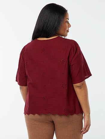 Blusa tinta unita con ricami e allacciatura con cordoncini
