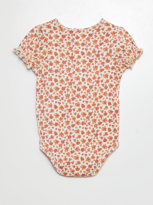 Body a coste con motivo floreale - Kiabi