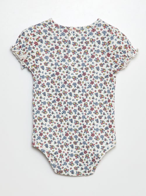 Body a coste con motivo floreale - Kiabi