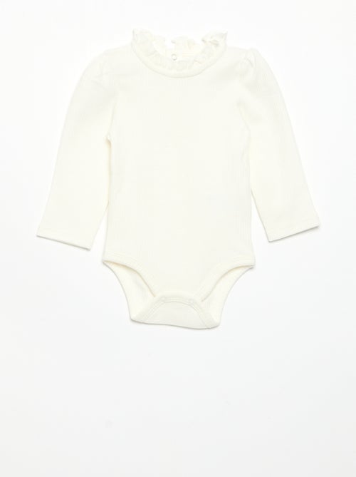 Body a costine con collo fantasia - Kiabi