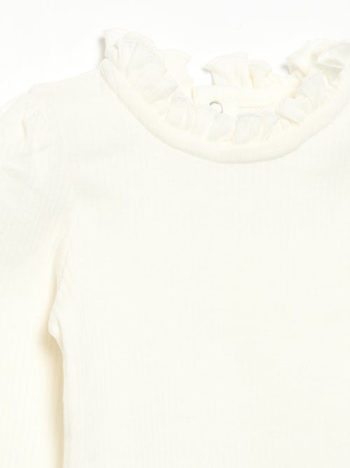 Body a costine con collo fantasia - Kiabi