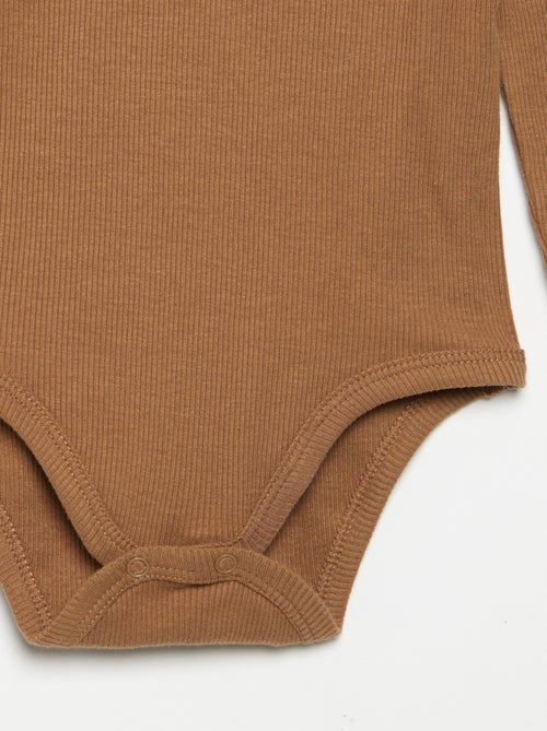 Body a maniche lunghe e collo abbottonato - Kiabi Body a maniche lunghe e collo abbottonato - Kiabi