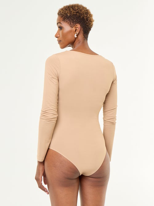 Body a maniche lunghe e collo rotondo - Kiabi Body a maniche lunghe e collo rotondo - Kiabi