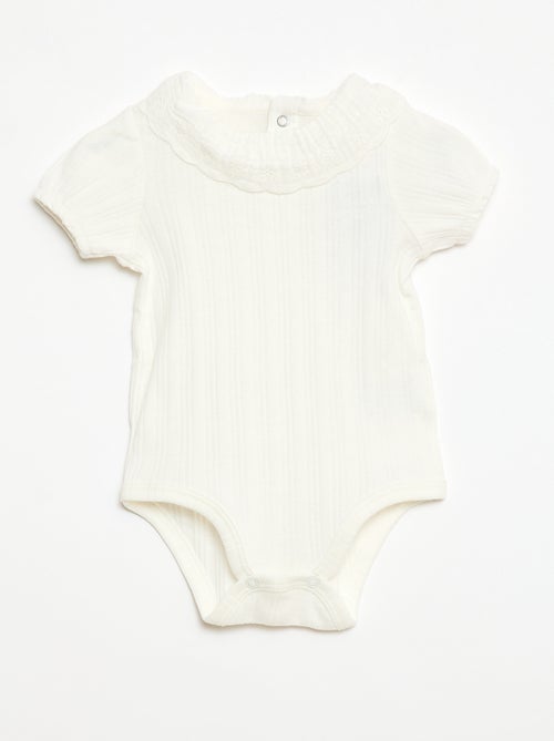 Body a maniche lunghe in maglia a costine con colletto fantasia - Kiabi