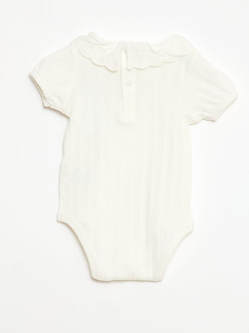 Body a maniche lunghe in maglia a costine con colletto fantasia - Kiabi