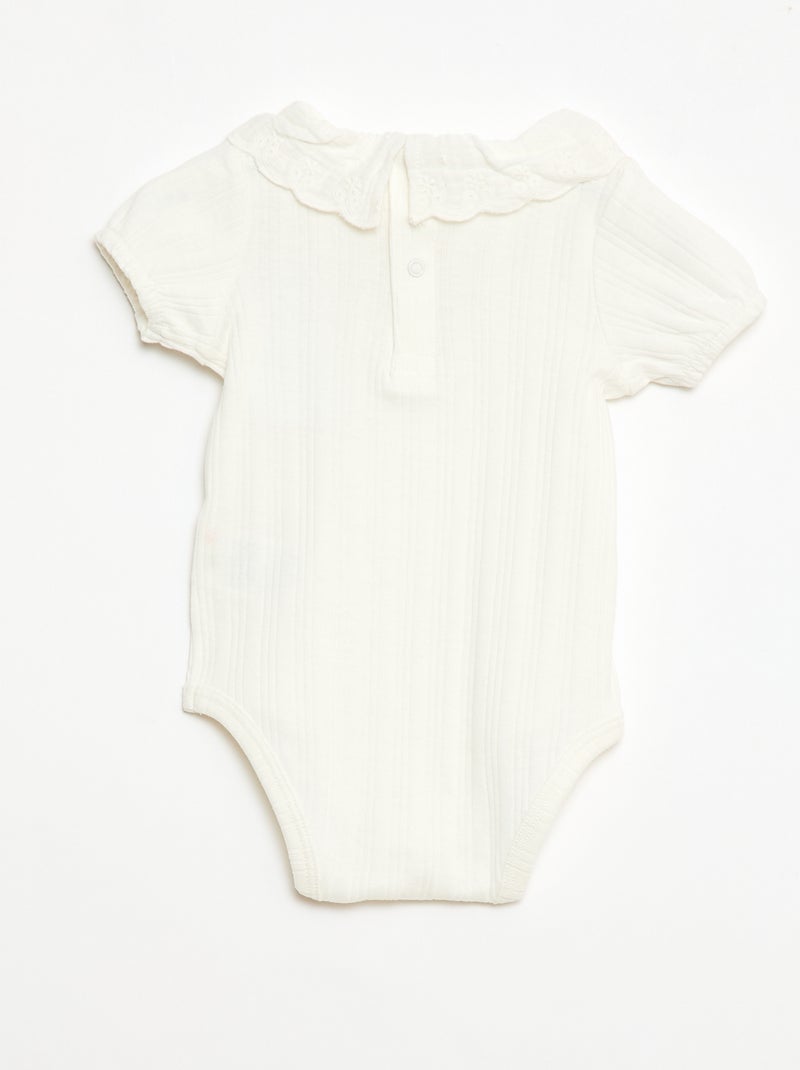 Body a maniche lunghe in maglia a costine con colletto fantasia Bianco - Kiabi