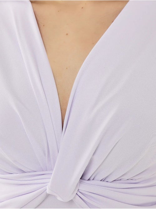 Body aderente a maniche lunghe con scollo a v hiccup - Kiabi Body aderente a maniche lunghe con scollo a v hiccup - Kiabi