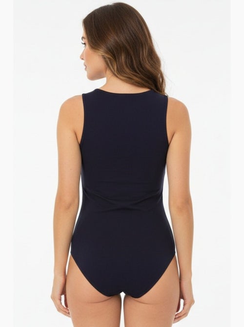 Body aderente senza maniche con scollo rotondo e chiusura a bottoni a pressione bdart - Kiabi Body aderente senza maniche con scollo rotondo e chiusura a bottoni a pressione bdart - Kiabi