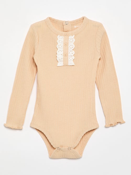Body in maglia a costine con ricamo sangallo - Kiabi Body in maglia a costine con ricamo sangallo - Kiabi