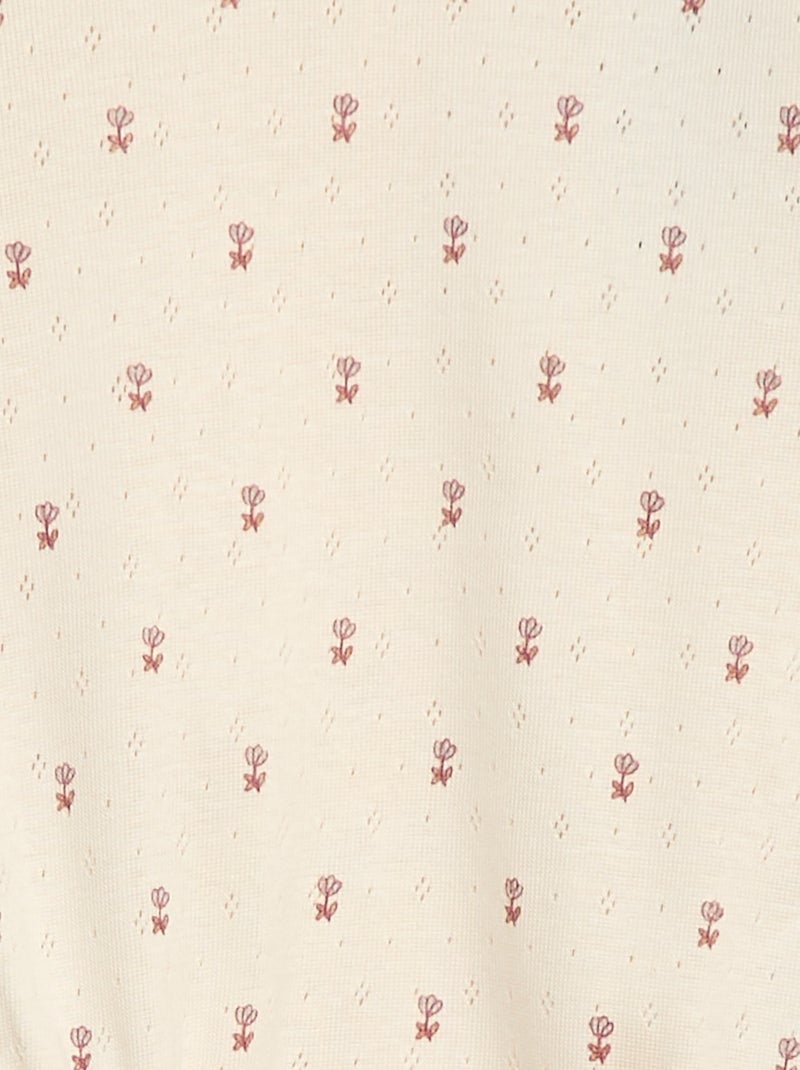 Body in maglia operata con colletto a volant e motivo all over Bianco - Kiabi